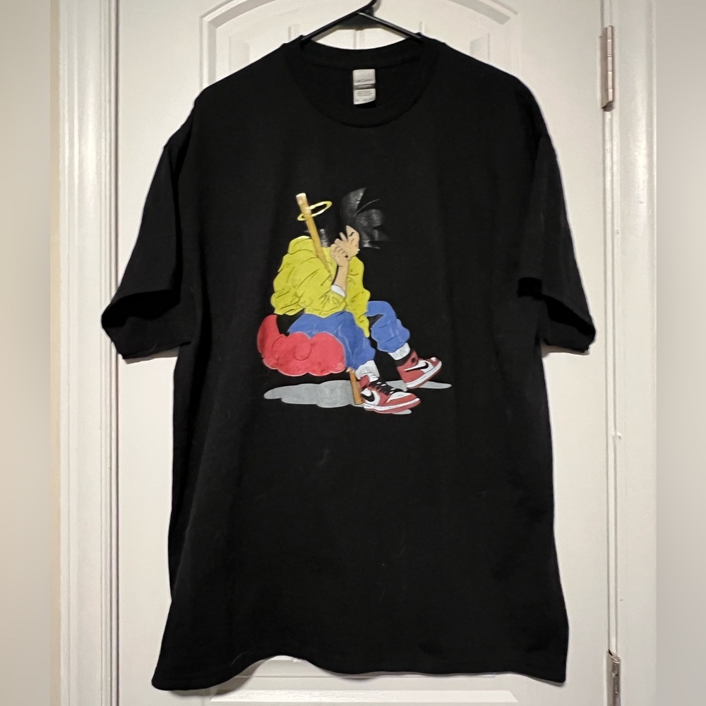 NWOT! Black Graphic T-Shirt with Cartoon Design